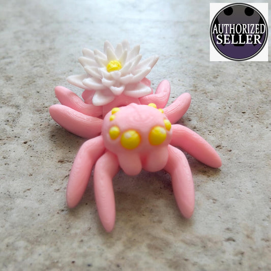 Art 0387 Flexi Spinne mit Wasserlilie| 3D-gedruckt| ca 6,5*5,5cm breit | PLA rosa weiß gelb Deko & Geschenk für Fantasy-Fans